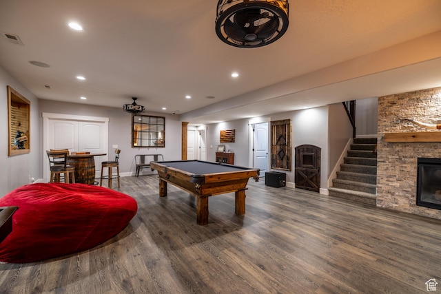 4311 N Diamond Ln, Erda, UT 84074 - recreation room featuring a fireplace, wood finished floors, recessed lighting, billiards table, and bar area