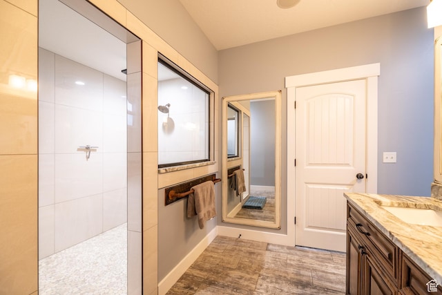 4311 N Diamond Ln, Erda, UT 84074 - bathroom with walk in shower, vanity, and wood finished floors