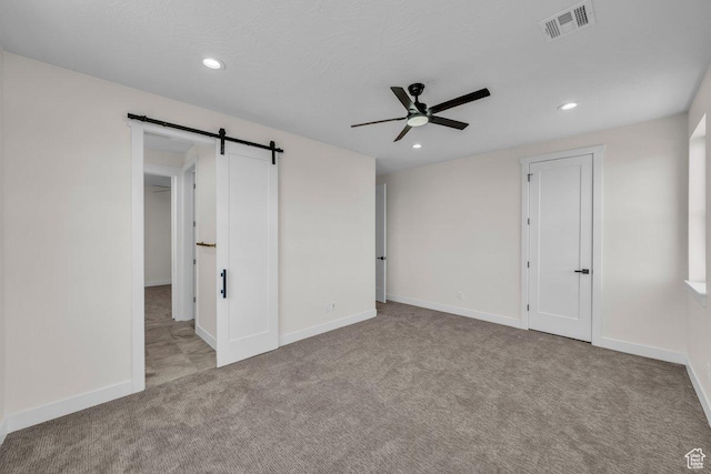 21 W Elinor Ln, Washington, UT 84780 - unfurnished bedroom featuring a barn door, carpet, recessed lighting, and a ceiling fan