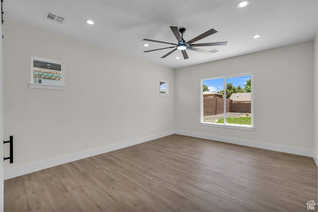21 W Elinor Ln, Washington, UT 84780 - spare room featuring wood finished floors, recessed lighting, and ceiling fan