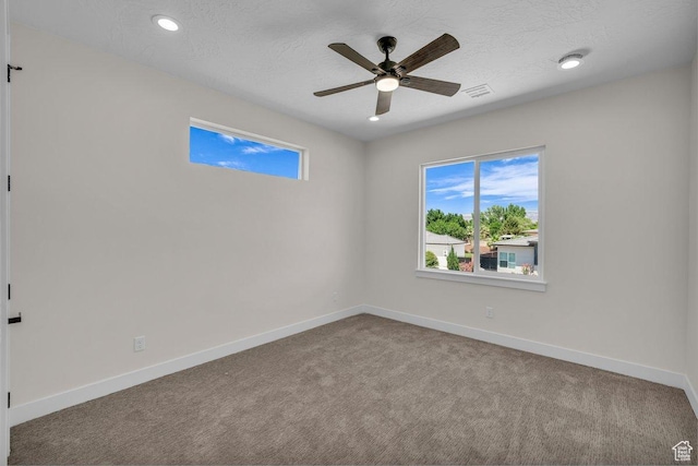 21 W Elinor Ln, Washington, UT 84780 - carpeted empty room with healthy amount of natural light, a ceiling fan, recessed lighting, and a textured ceiling