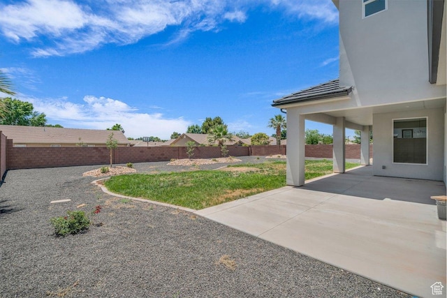 21 W Elinor Ln, Washington, UT 84780 - fenced backyard featuring a patio