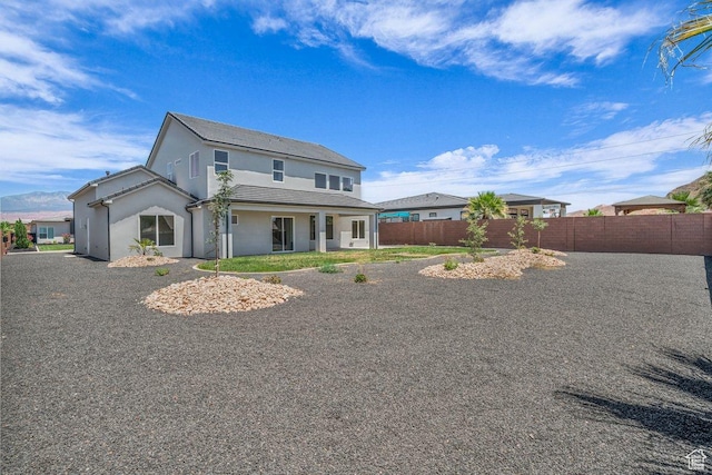 21 W Elinor Ln, Washington, UT 84780 - rear view of house featuring stucco siding