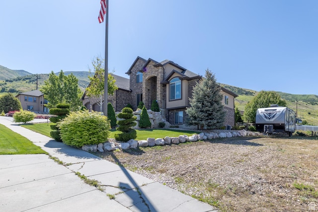 39 E 1800 S, Perry, UT 84302 - view of front of property featuring stone siding and a mountain view