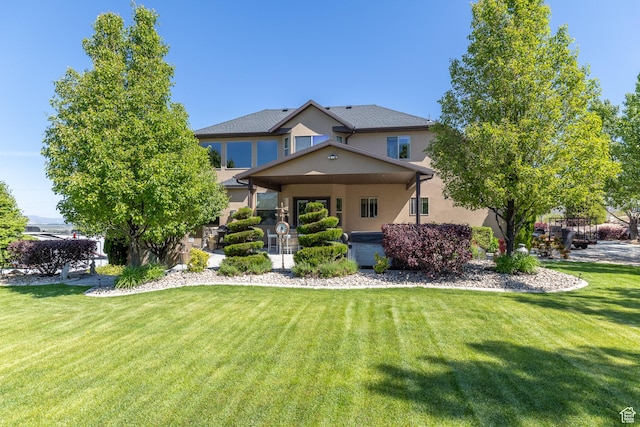 39 E 1800 S, Perry, UT 84302 - view of front of house with stucco siding and a front yard