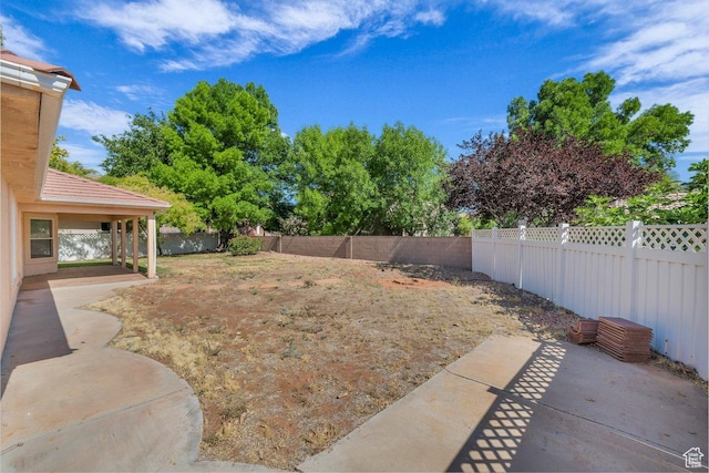 579 E Spring Cir, Washington, UT 84780 - fenced backyard with a patio