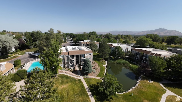 1040 E Quail Park Dr Unit B, Millcreek, UT 84117 - aerial view of a water and mountain view and a pool area