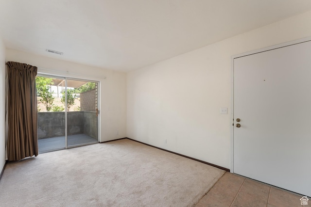 1040 E Quail Park Dr Unit B, Millcreek, UT 84117 - empty room featuring tile patterned flooring