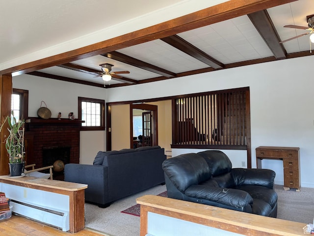 102 N 300 E, Moab, UT 84532 - carpeted living room with a ceiling fan, beamed ceiling, a fireplace, and baseboard heating