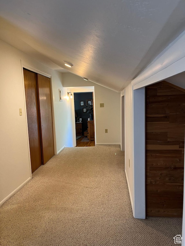 102 N 300 E, Moab, UT 84532 - corridor featuring vaulted ceiling and carpet