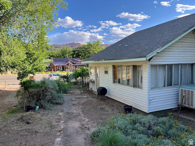 102 N 300 E, Moab, UT 84532 - view of side of property featuring a shingled roof