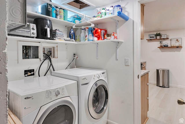 290 N 300 W, Logan, UT 84321 - laundry area with washer and clothes dryer and wood finished floors