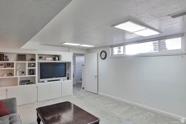 290 N 300 W, Logan, UT 84321 - living room featuring a textured ceiling and light colored carpet