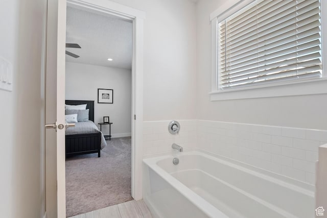 1304 E Weyburn Ln S Unit 10, Holladay, UT 84117 - ensuite bathroom with a bath and ceiling fan