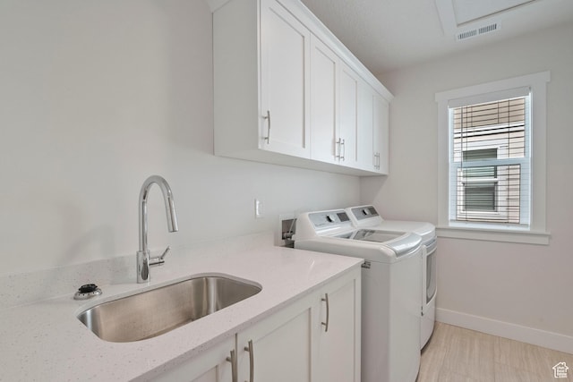 1304 E Weyburn Ln S Unit 10, Holladay, UT 84117 - washroom with washer and dryer and cabinet space