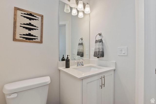 1304 E Weyburn Ln S Unit 10, Holladay, UT 84117 - bathroom with toilet and vanity