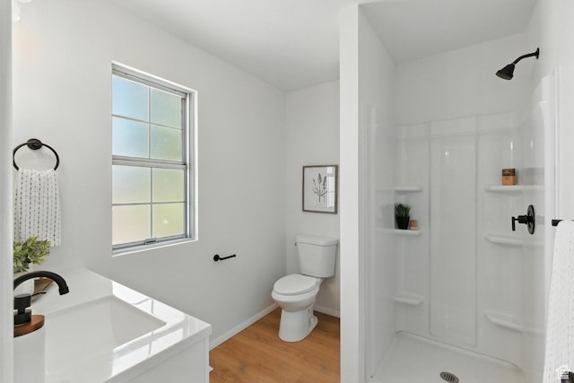 585 N 700 E, Nephi, UT 84648 - bathroom with a shower stall, wood finished floors, and vanity