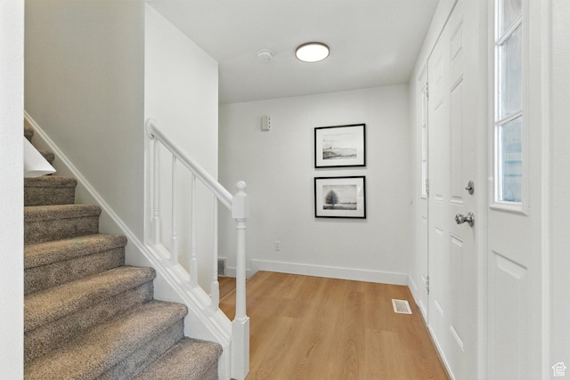 585 N 700 E, Nephi, UT 84648 - entrance foyer featuring stairs and light wood-type flooring