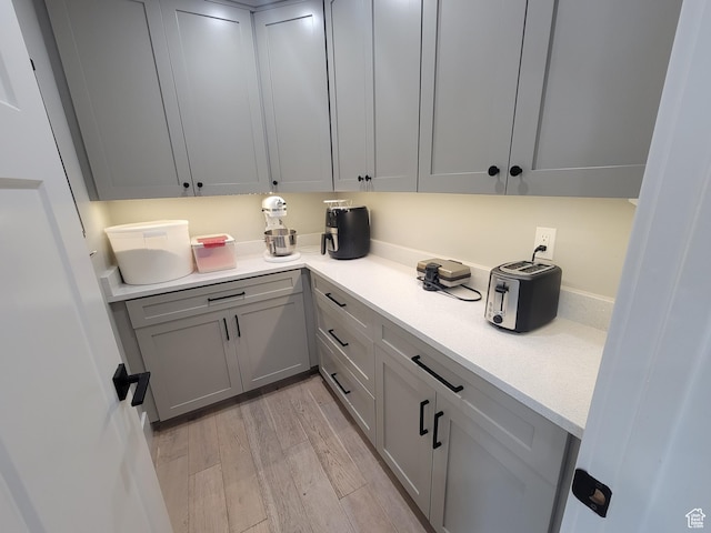 298 E 400 S, Orem, UT 84058 - kitchen with light wood finished floors, light countertops, and gray cabinets