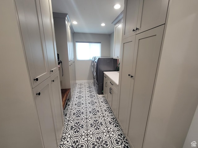 298 E 400 S, Orem, UT 84058 - laundry room featuring washer and dryer, recessed lighting, cabinet space, and light tile patterned floors
