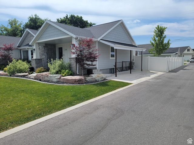 298 E 400 S, Orem, UT 84058 - view of front of property featuring a shingled roof, stone siding, and covered porch