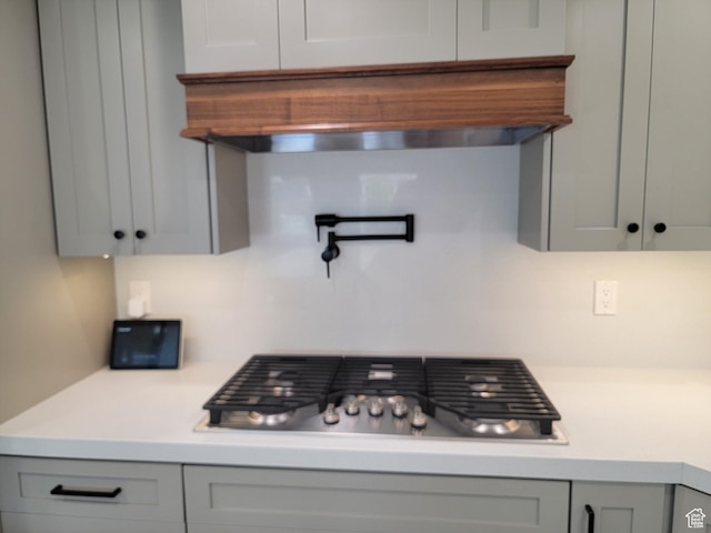 298 E 400 S, Orem, UT 84058 - kitchen featuring gray cabinetry, stainless steel gas stovetop, and light countertops