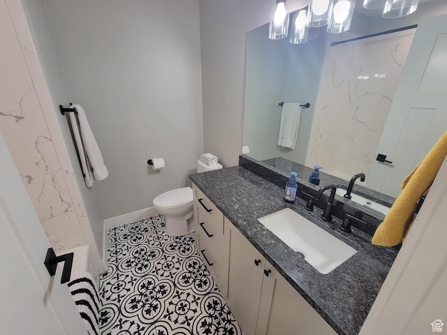 298 E 400 S, Orem, UT 84058 - full bathroom featuring vanity, a marble finish shower, and tile patterned floors