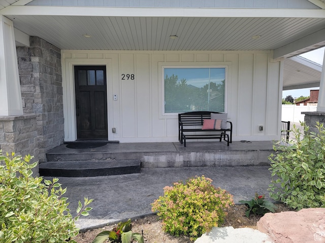 298 E 400 S, Orem, UT 84058 - entrance to property featuring board and batten siding, covered porch, and stone siding