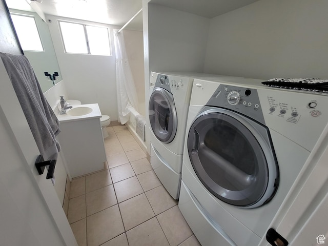 298 E 400 S, Orem, UT 84058 - laundry area with separate washer and dryer and light tile patterned floors