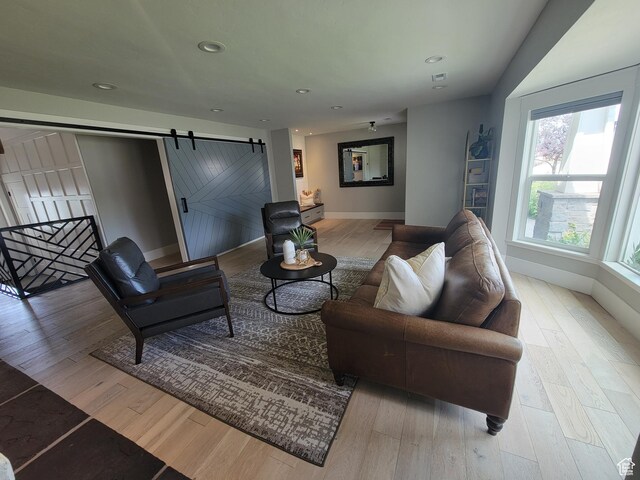 298 E 400 S, Orem, UT 84058 - living room with a barn door, recessed lighting, and wood finished floors