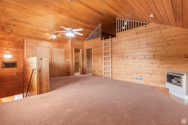 294 W 200 N, Mount Pleasant, UT 84647 - unfurnished living room with wood ceiling, carpet, ceiling fan, wood walls, and high vaulted ceiling