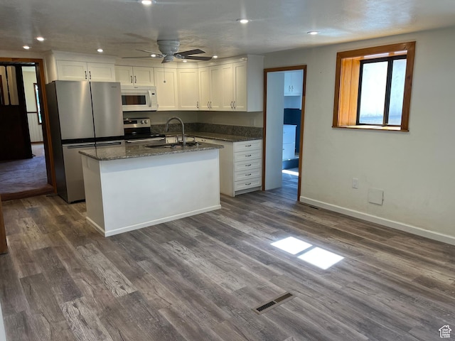 294 W 200 N, Mount Pleasant, UT 84647 - kitchen with stainless steel appliances, white cabinetry, dark wood-style flooring, and recessed lighting