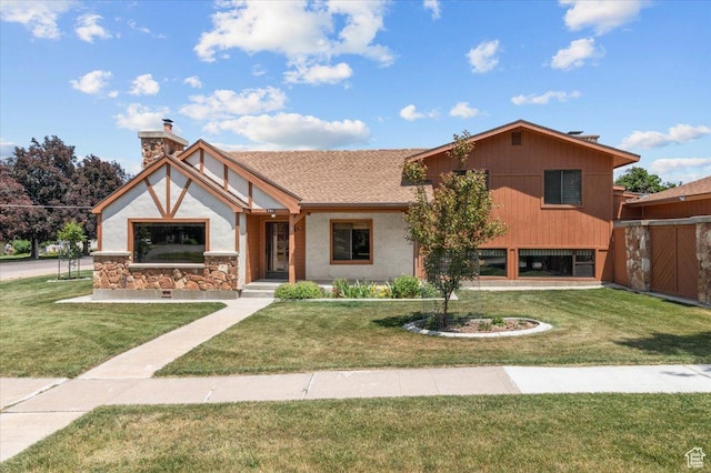 294 W 200 N, Mount Pleasant, UT 84647 - english style home featuring a front yard, a chimney, and stone siding