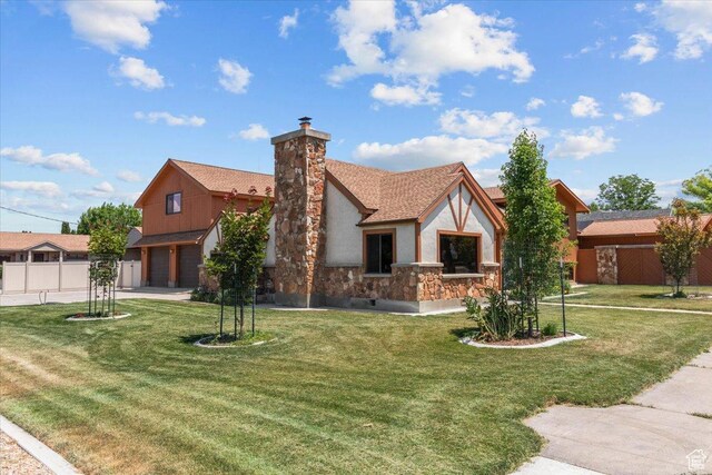 294 W 200 N, Mount Pleasant, UT 84647 - english style home featuring stone siding, a garage, a chimney, and a front lawn