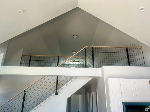 599 N State St, Mayfield, UT 84643 - staircase with lofted ceiling and recessed lighting