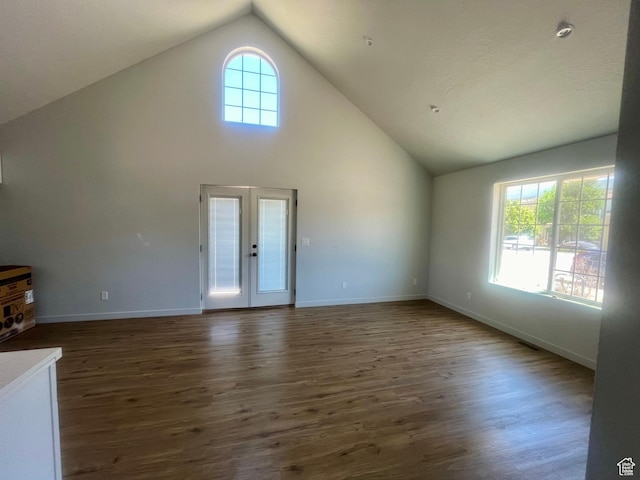 599 N State St, Mayfield, UT 84643 - unfurnished living room featuring dark wood-type flooring, french doors, and high vaulted ceiling