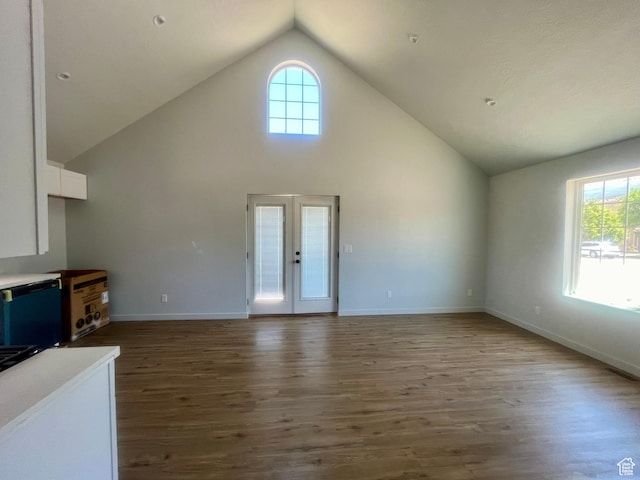 599 N State St, Mayfield, UT 84643 - unfurnished living room featuring plenty of natural light, wood finished floors, high vaulted ceiling, and french doors
