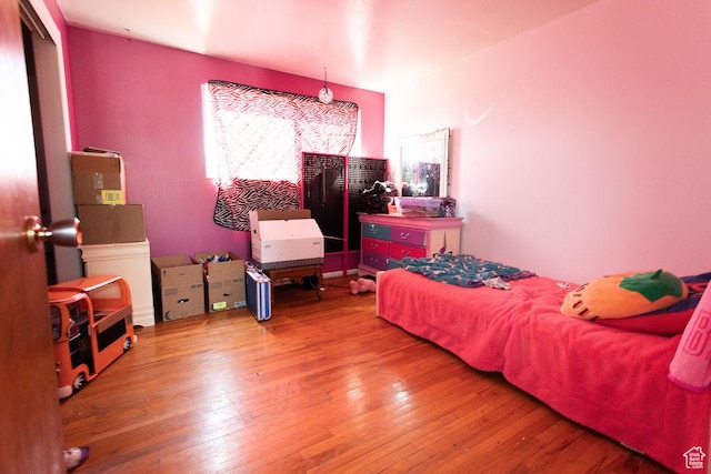 960 N 100 W, Tremonton, UT 84337 - bedroom with wood-type flooring and multiple windows