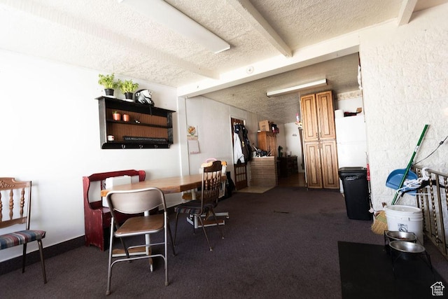 960 N 100 W, Tremonton, UT 84337 - dining room featuring a textured ceiling, carpet floors, and beam ceiling