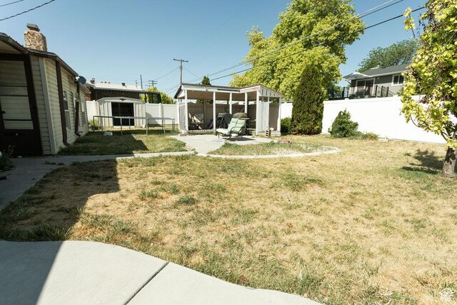 960 N 100 W, Tremonton, UT 84337 - fenced backyard with a patio