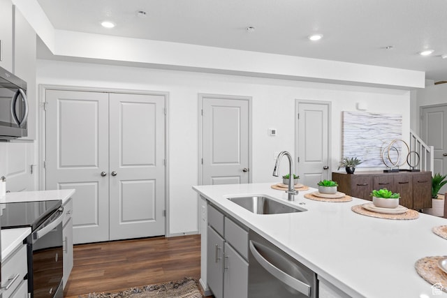 201 E 400 S Unit 982, Saratoga Springs, UT 84045 - kitchen featuring stainless steel appliances, light countertops, dark wood-type flooring, and recessed lighting