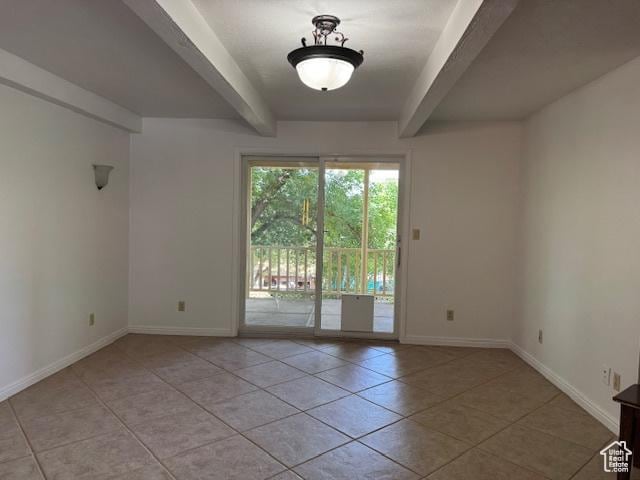 2727 N 700 E, Provo, UT 84604 - empty room featuring beam ceiling and light tile patterned flooring