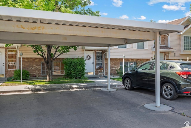 70 E 135 N, Orem, UT 84057 - view of front facade featuring covered parking and brick siding