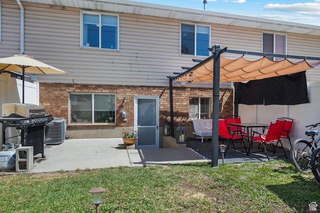 70 E 135 N, Orem, UT 84057 - rear view of house with a pergola, brick siding, a lawn, and a patio