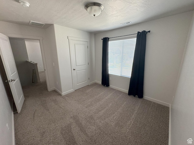 1637 S 730 W, Provo, UT 84601 - unfurnished bedroom with carpet flooring and a textured ceiling