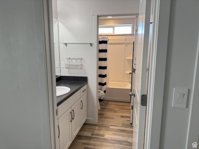 1637 S 730 W, Provo, UT 84601 - full bath with wood finished floors, vanity, and shower / tub combo