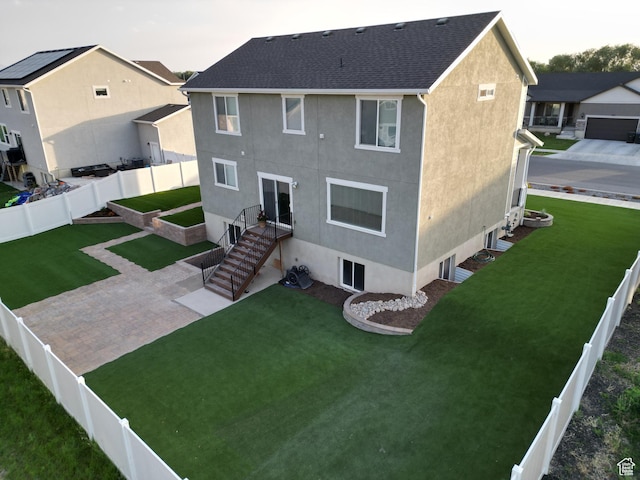 1637 S 730 W, Provo, UT 84601 - back of house with stucco siding, a fenced backyard, and a patio