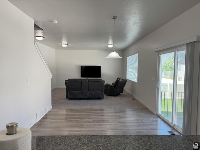 1637 S 730 W, Provo, UT 84601 - carpeted living room featuring baseboards and wood finished floors