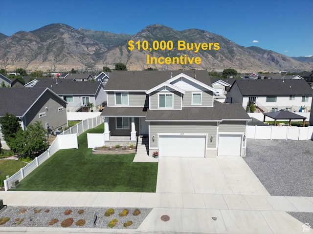 1637 S 730 W, Provo, UT 84601 - view of front of home featuring a residential view, a mountain view, driveway, a garage, and a shingled roof