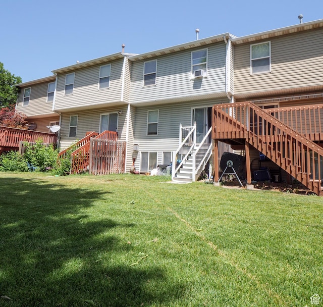 1193 W Dun Robin Ct, Murray, UT 84123 - back of property with stairway, a wooden deck, and a yard